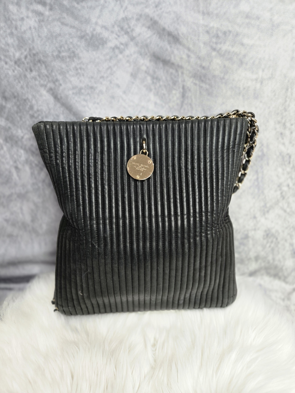 Henri Bendel quilted black leather shoulder bag with a gold chain strap
